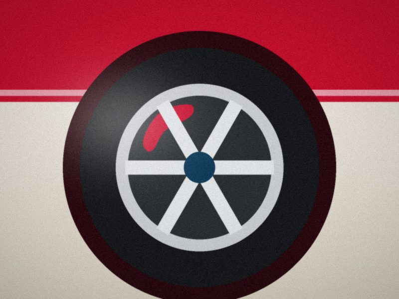 Gros plan sur une roue à six branches et son étrier rouge